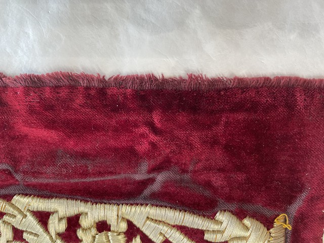 Close up, front - whip stitch on side of garment