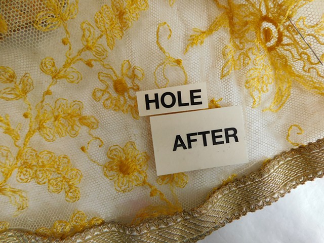 Hole after patch has been sewn on, front