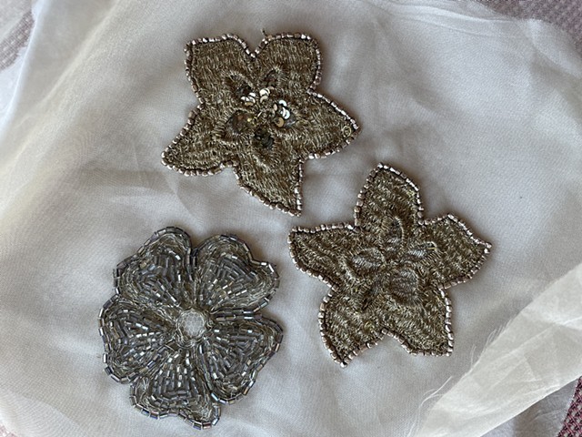 Hand embellished antique lace flowers in progress