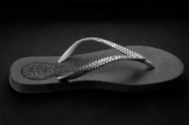 A Sole Full of Stars | Single flip-flop with plastic rhinestones and concave heel