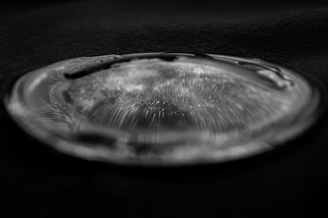 A Vase Full of Stars | Sheared base of a large glass vessel, perhaps a vase, with no trace of the remainder of the object