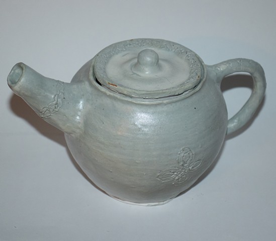 Carved Irish teapot. 2023