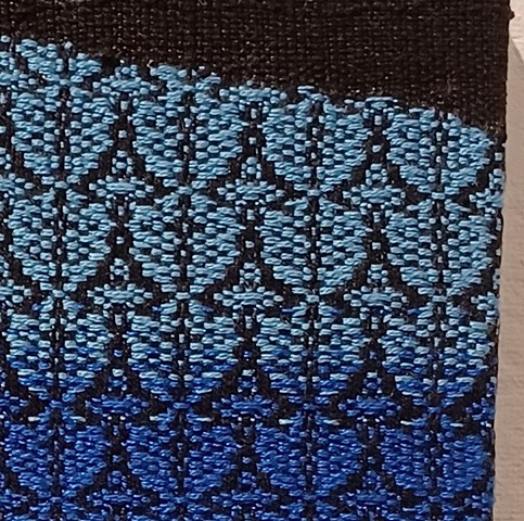 Weaving Together; above the Artist Hand