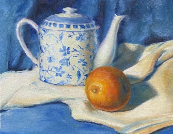 Still life with teapot and orange