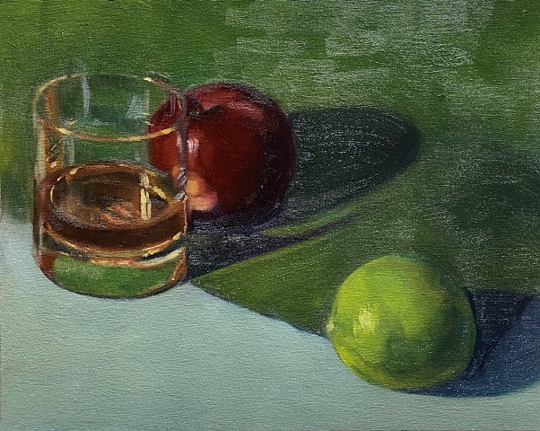 Still life with whiskey, apple and lime