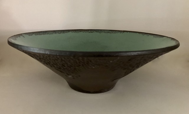 large wide rimmed bowl