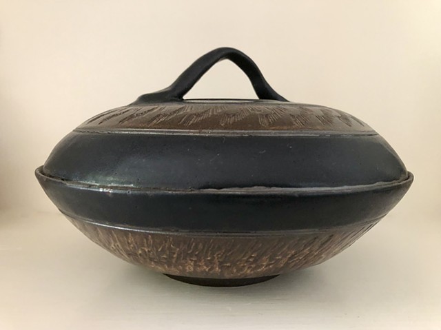 large covered bowl