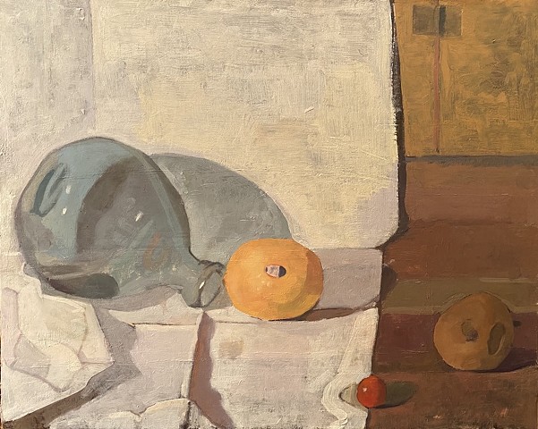 Glass Bottle and Orange