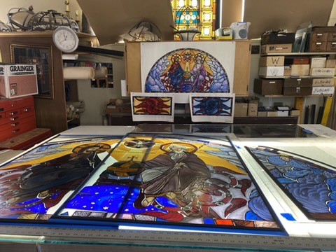 the painted glass sitting on the light table