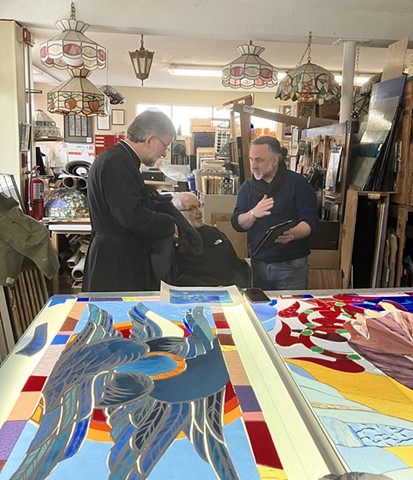 meeting with the priests at the glass studio