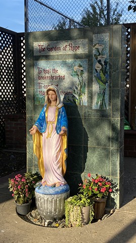 finished polychrome of Madonna Statue in the outdoor Peace Garden