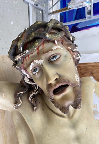 restoration of 100+ year old plaster statue of a corpus
