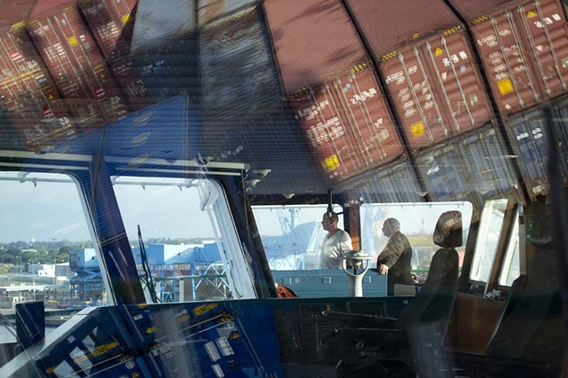 Hull pilot guiding the captain of the Misana into port; From "Majestic Monotony"