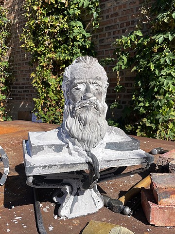 Process shot of Marshall's self portrait in cast iron 