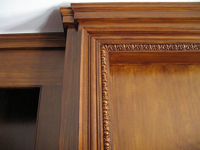 Detail faux mahogany finish