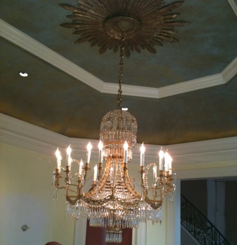 Painted gold ceiling with distressed gold leaf plaster medallion