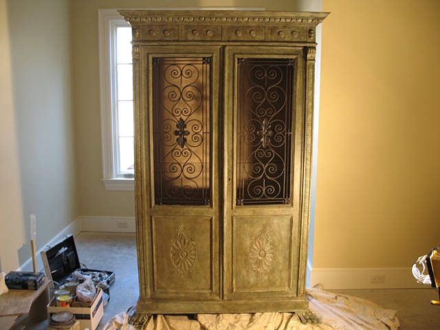 Glazed and distressed antique cabinet