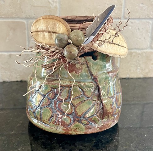 stoneware, pine needles, weaving, seed, bead, feather, mixed media,  glaze, cup,  