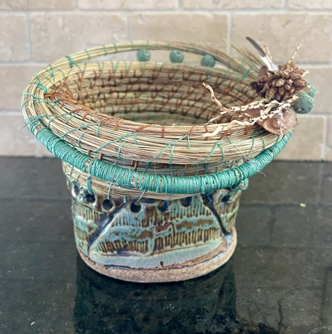 stoneware, green, textured, mixed media, feather, dried seed pod, cylinder, 