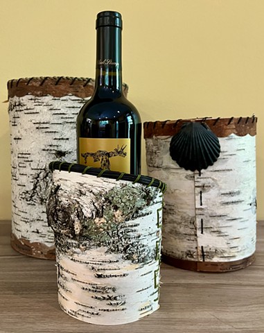 Varying size birch bark containers