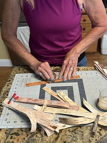 Prepping strips for weaving