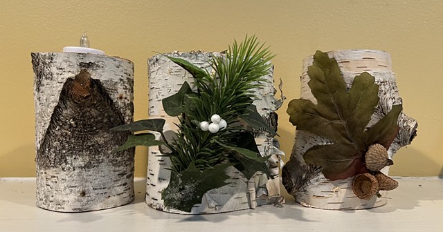 Birch bark log candles with battery operated tea lights