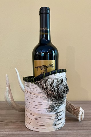 Cannister with black pine needle edge and forest green waxed linen thread