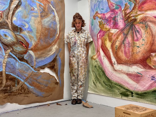 Carlea with works in studio