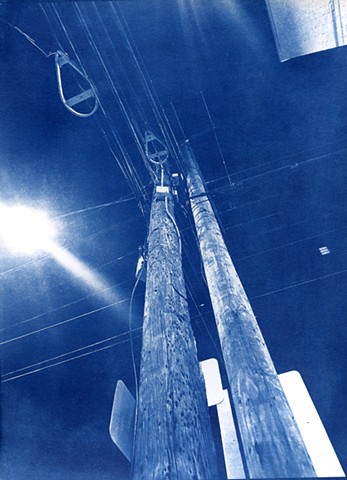 looking up a pole at night