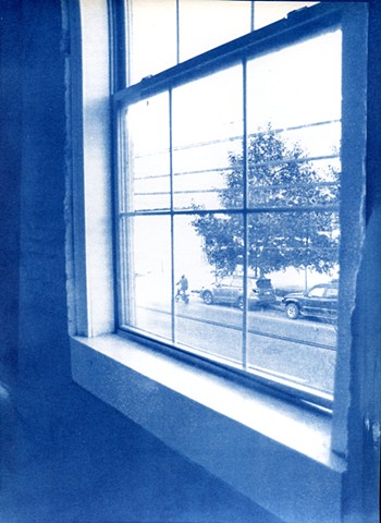 peering through a stairwell window 