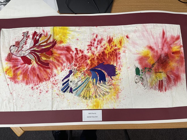 Hand embroidered flying fish over etching print and powdered dye. 