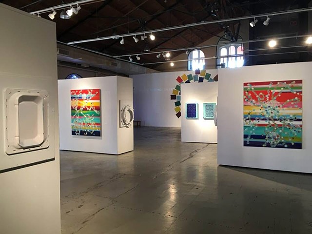 circles of light and the cloudless blue sky