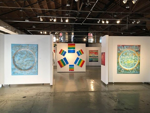 circles of light and the cloudless blue sky