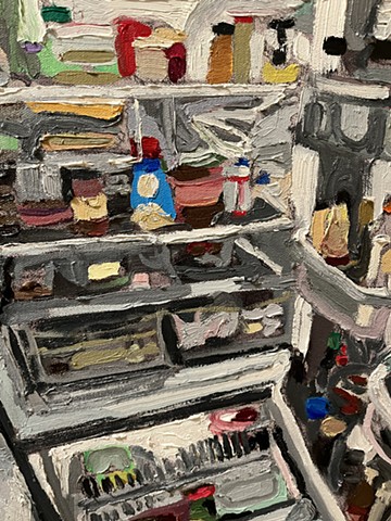 Fridge with red bottle