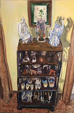Shelf with angels and dogs