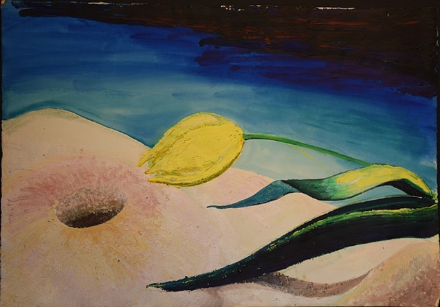 With blue in the background, a yellow tulip, with two leaves, bends towards a hole in the foreground.