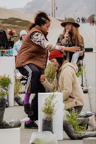 Irene Hse and Shareen DeRyan moving to the plants and surrounding dune ecology