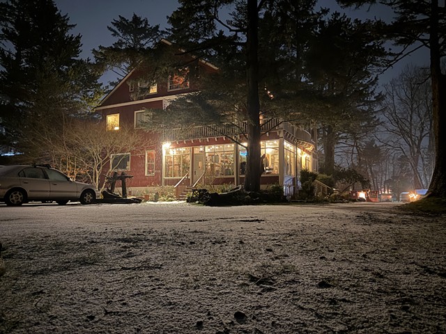 Lodge in Nighttime Snow