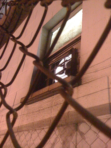 Fenced in Window, E Marginal Way (?). ~0201h