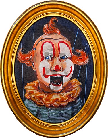 Circular clown painting of a puppet. Acrylic on board in vintage frame