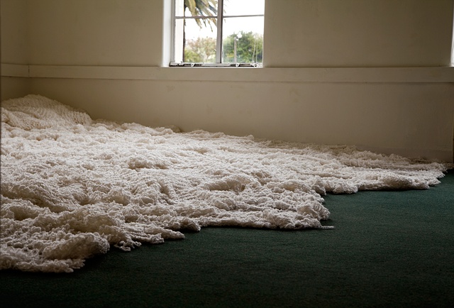 Miles of acrylic yarn, laid over the floor of Marin MOCA in Novato, CA. Modesto Covarrubias, artist.