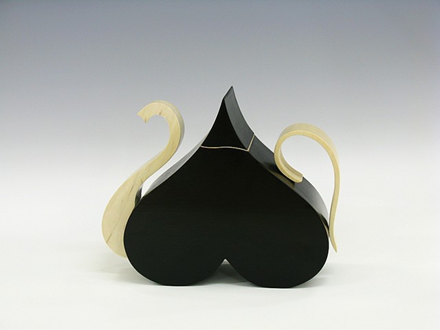 award winning wooden teapot symbolic