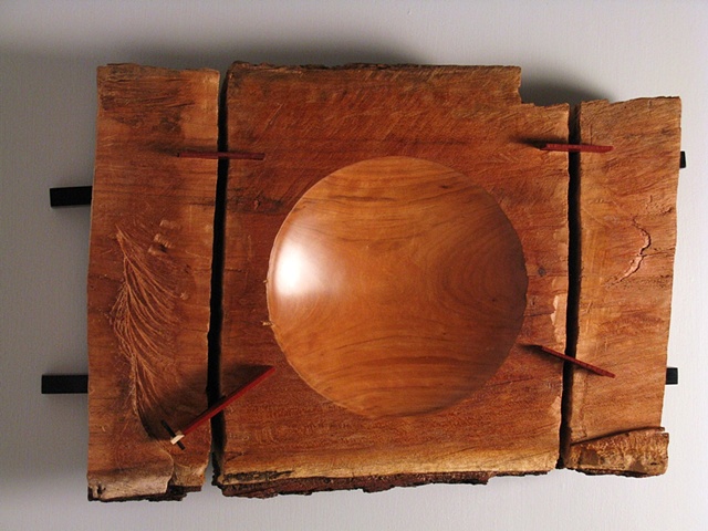 Sliced cherry slab with concave surface.