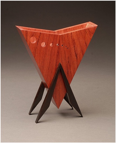 Jatoba Vessel is a unique sculptural wooden vessel of Jatoba and Walnut.