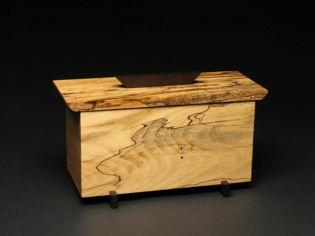 Wooden box of spalted Magnolia, ebonized Walnut and metal.