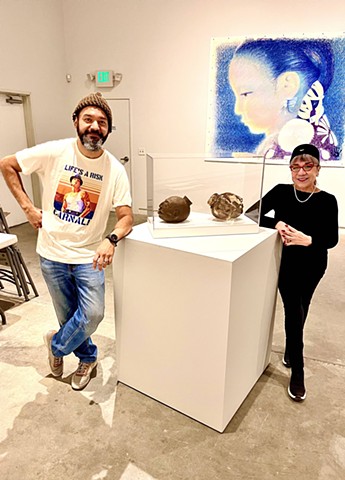 Me and artists Lorraine Garcia-Nakata installing her work at the Verge Center for the Arts in Sacramento, CA during my curated exhibition "R.C.A.F. Mid-Flight"
