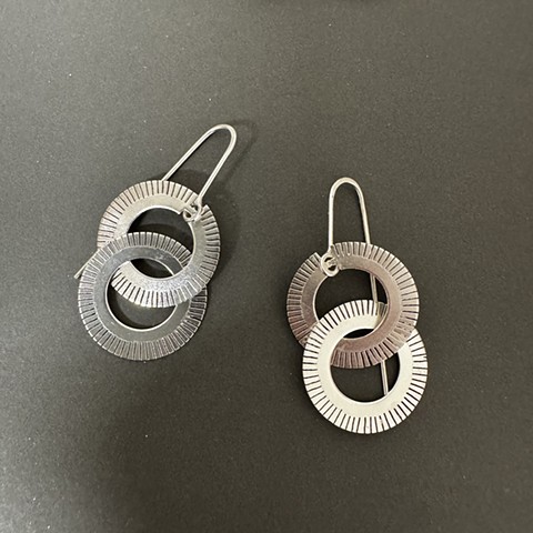 double Sun silver earrings