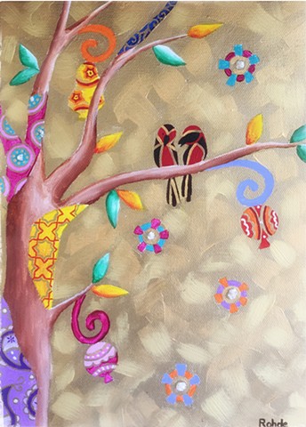 Birds sitting on a branch of the tree of life. Gold background and colorful patterns.