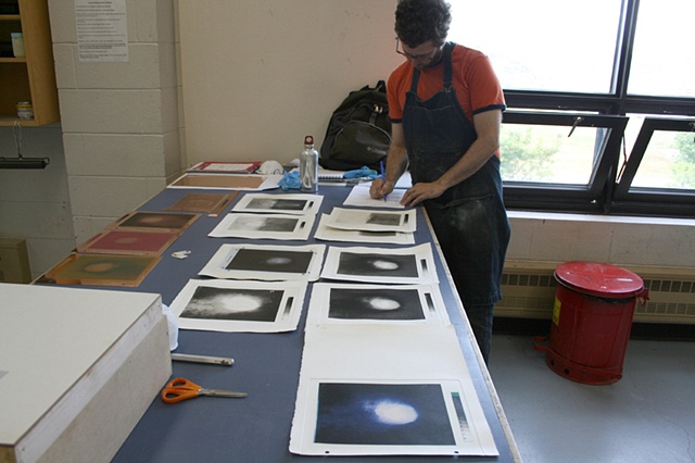 David Scott Armstrong making notes during proofing process