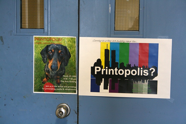 Printopolis posters on shop door